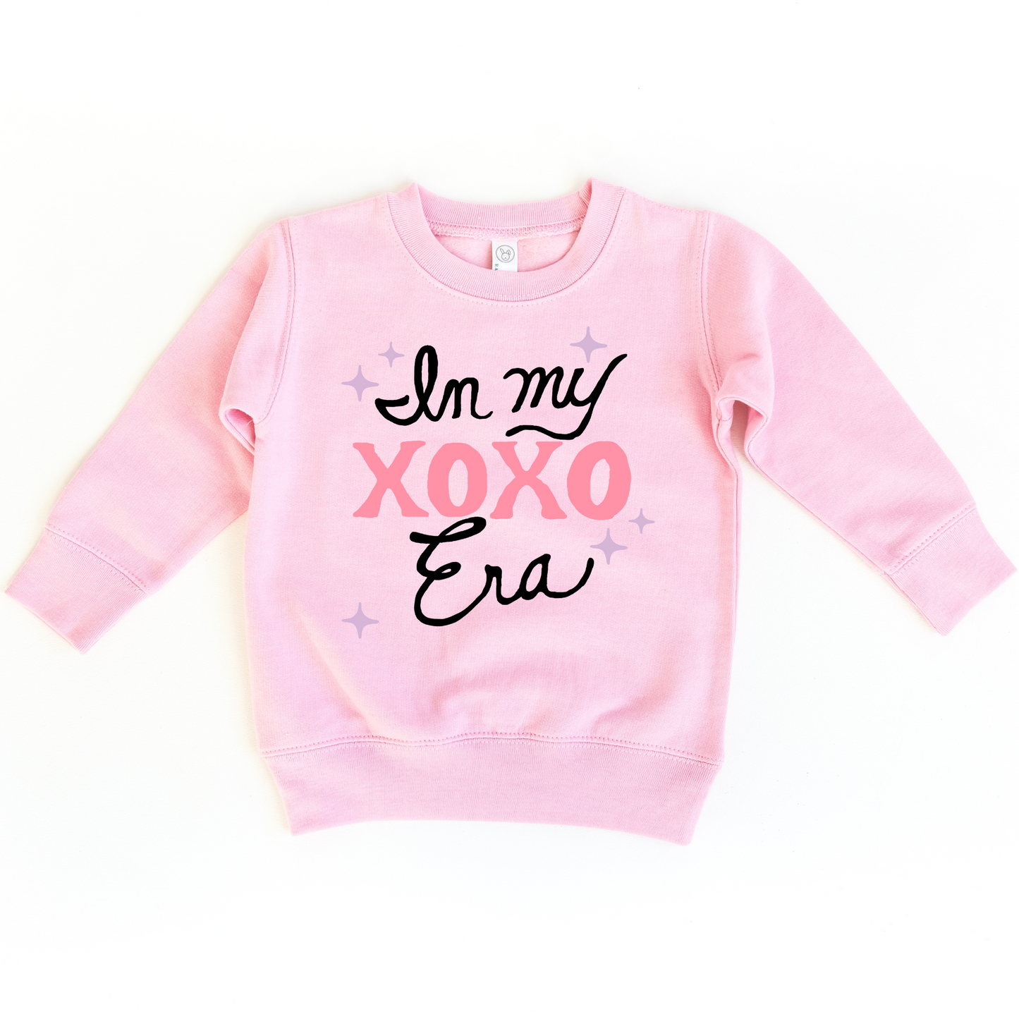 In my XOXO Era Sweater