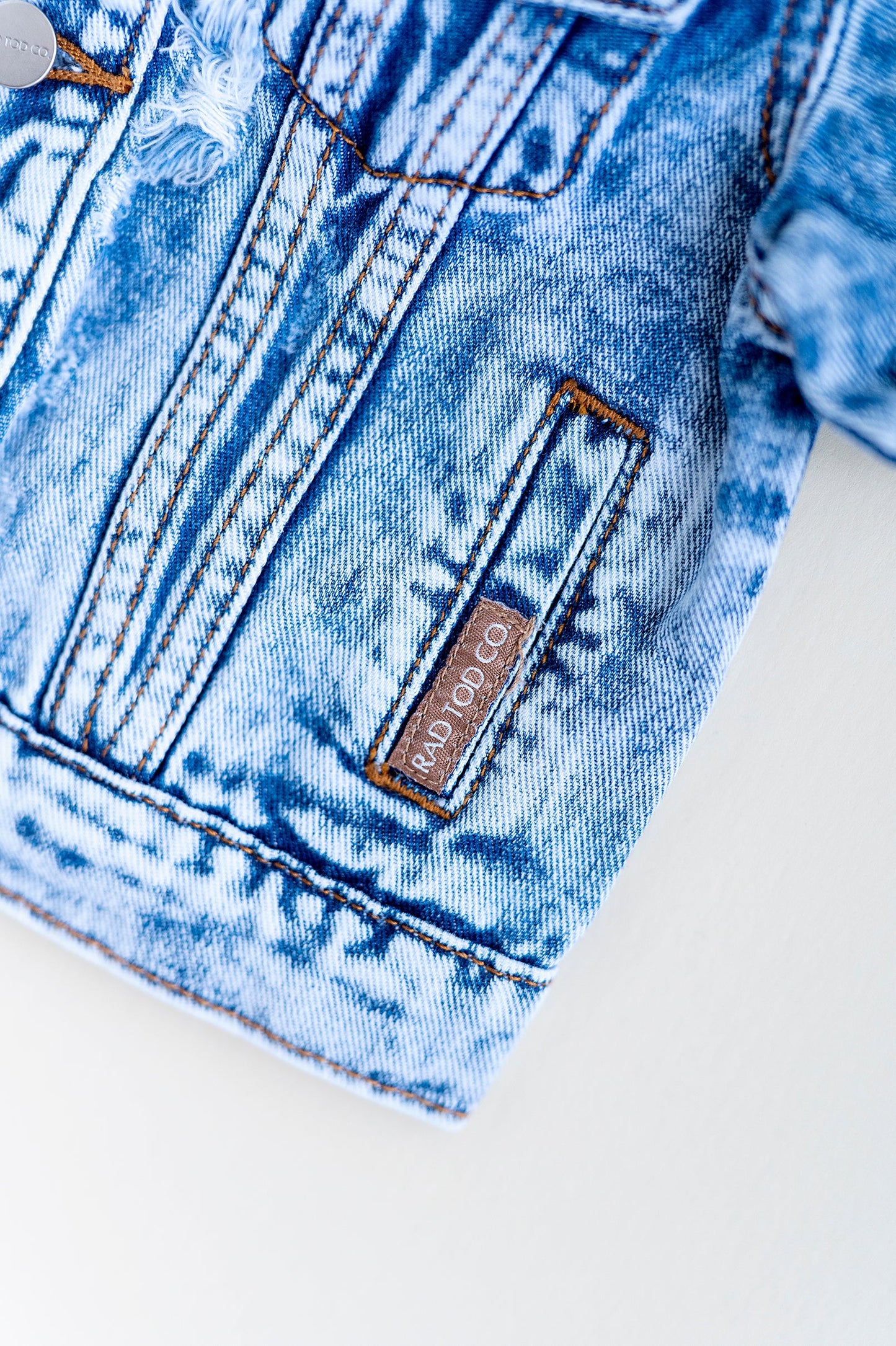 DISTRESSED DENIM JACKET