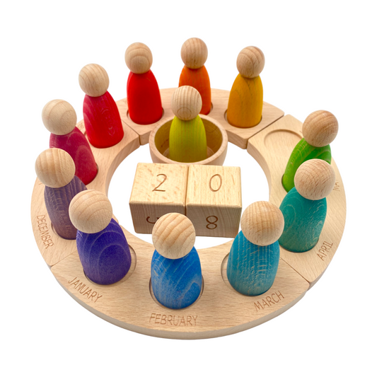 **Pre-order (Ships in 2-3 Weeks)**Wooden Perpetual Calendar with 12 Stained Rainbow Peg Figures
