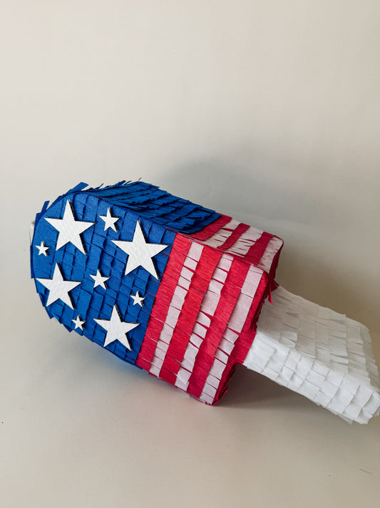 July Popsicle piñata (red,white,blue strips)