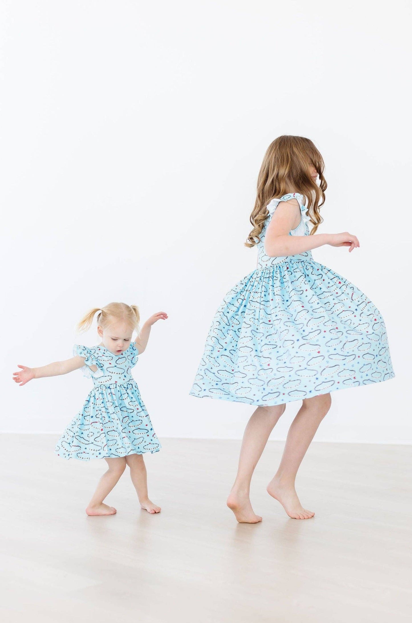 Miss Americana Flutter Sleeve Twirl Dress