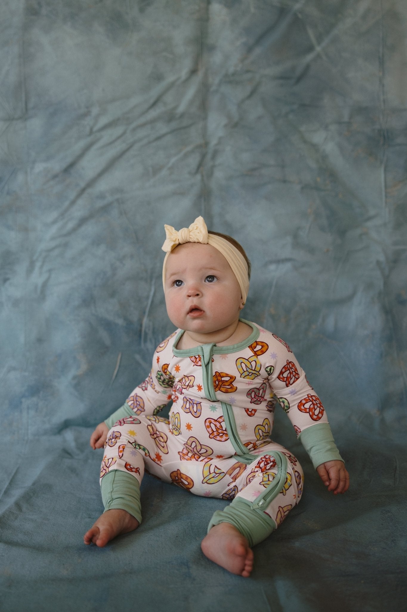 Colorful Pretzel Zipper Romper