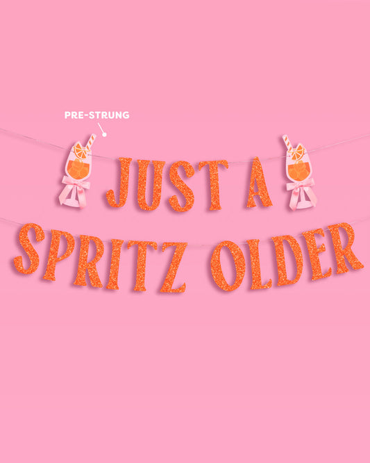 Just A Spritz Older Banner - orange glitter banner