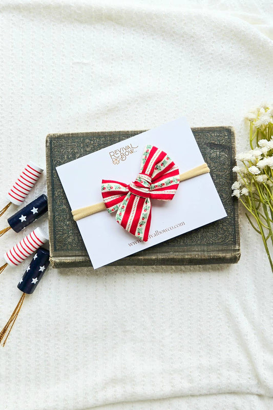 Small Pinwheel Bow on Headband • Red Floral Stripe
