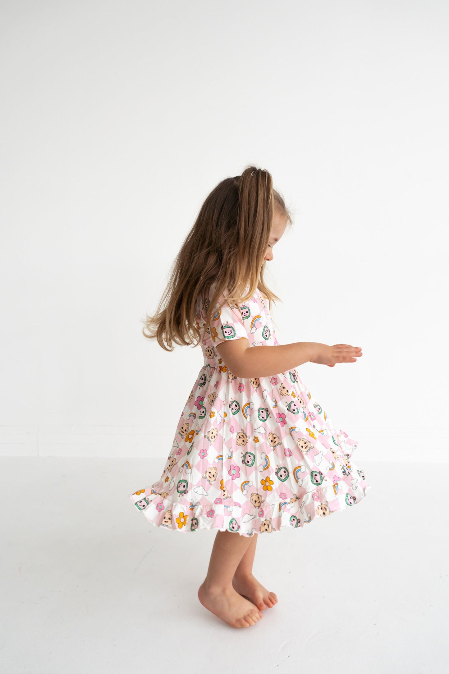 Dream Big Little Co x CoComelon JJ RAINBOW CHECKERS SHORT SLEEVE DREAM RUFFLE DRESS