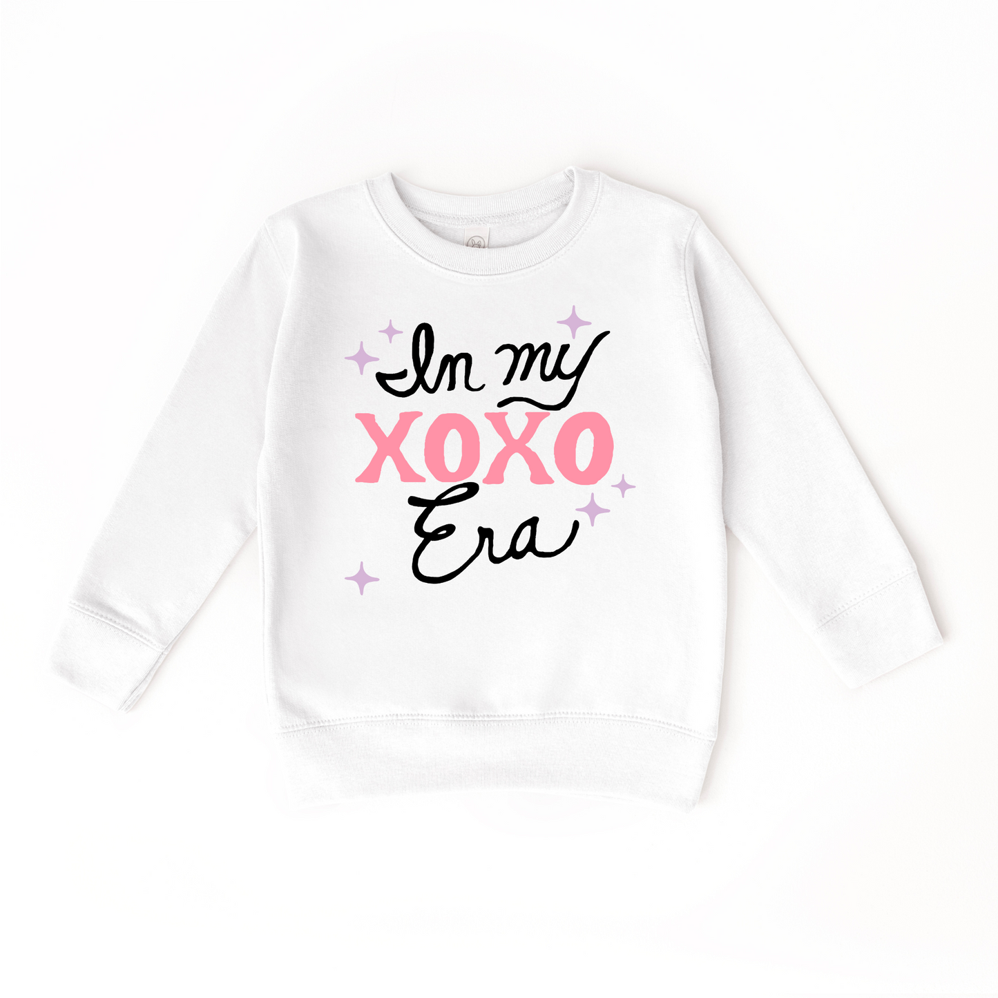 In my XOXO Era Sweater