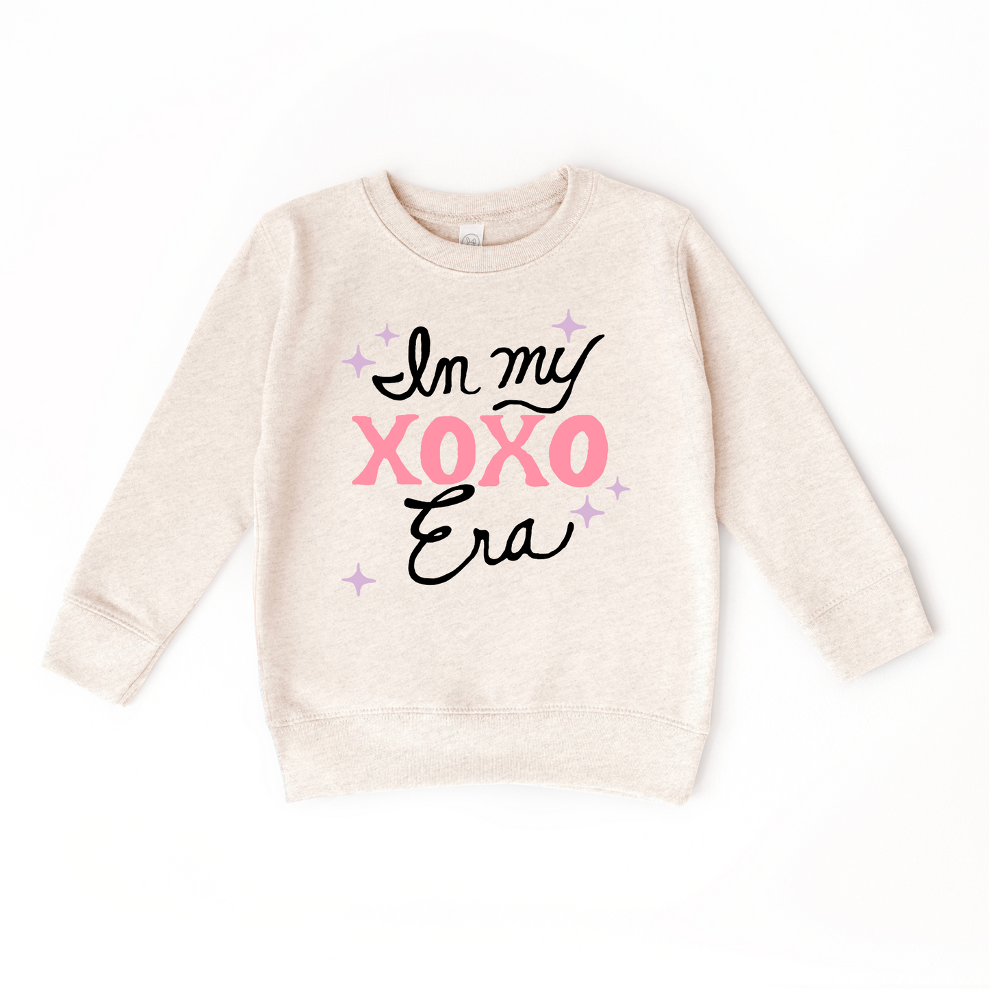 In my XOXO Era Sweater