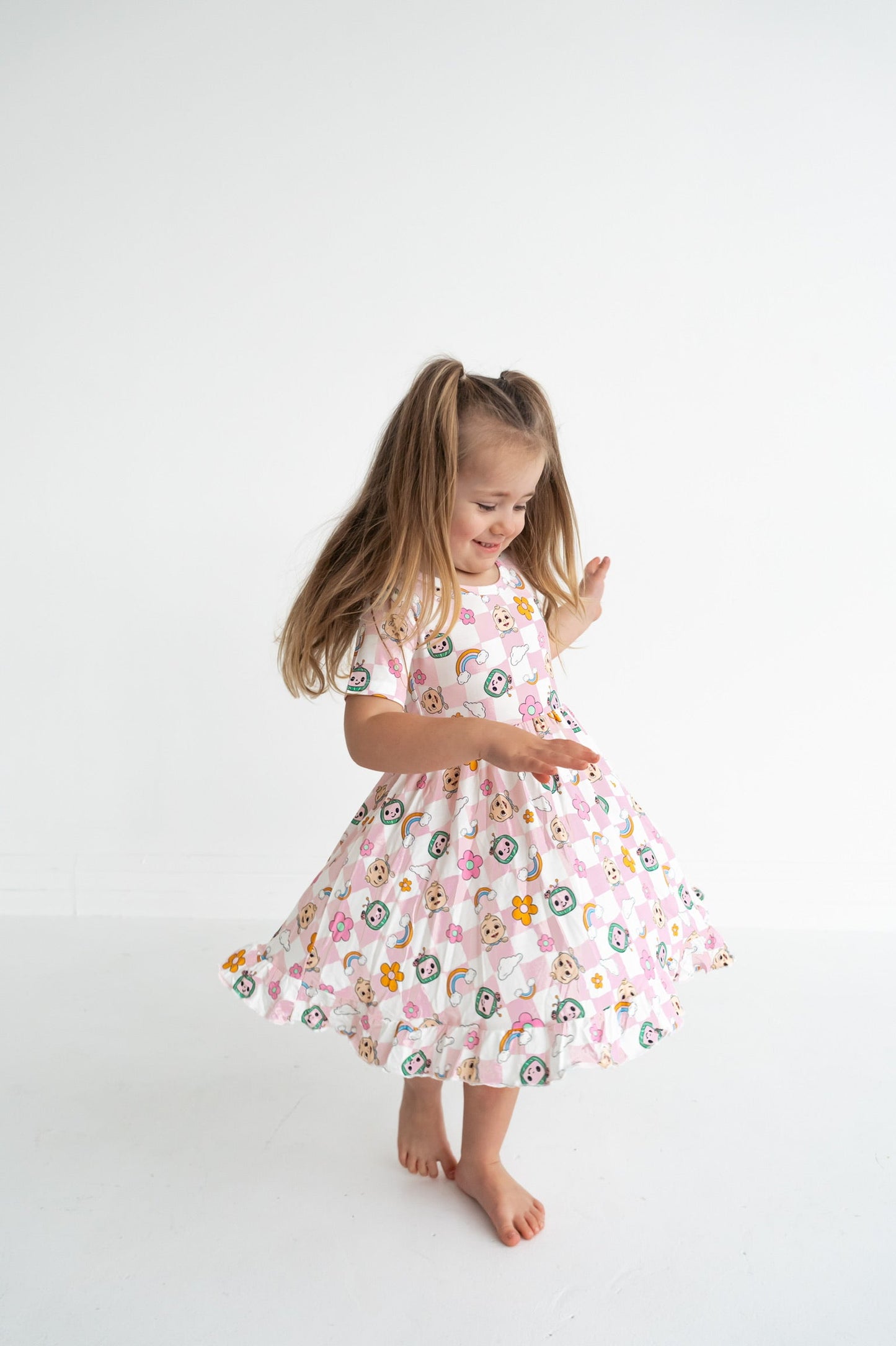 Dream Big Little Co x CoComelon JJ RAINBOW CHECKERS SHORT SLEEVE DREAM RUFFLE DRESS