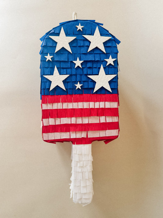 July Popsicle piñata (red,white,blue strips)