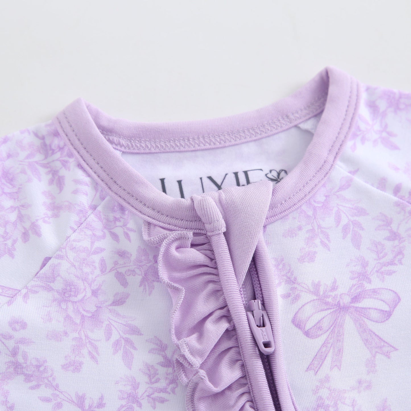 Bows & Blooms Ruffled Zippered Baby Romper