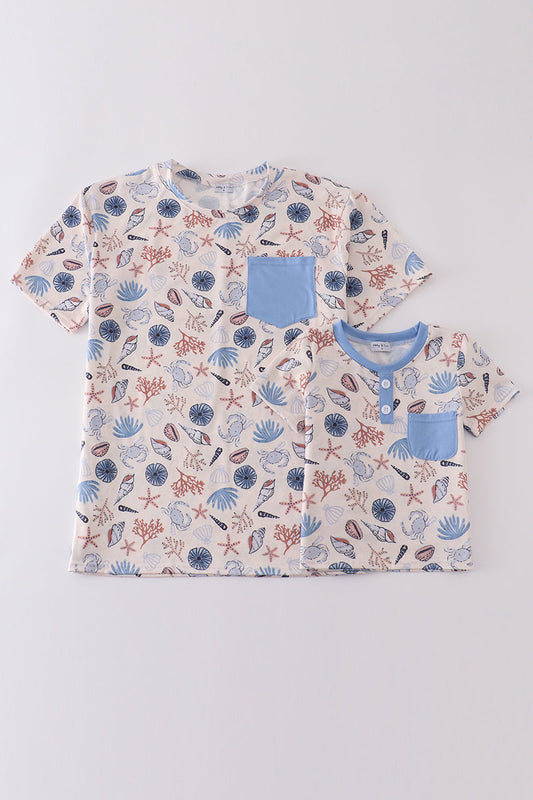 Blue ocean breeze shells print adult top