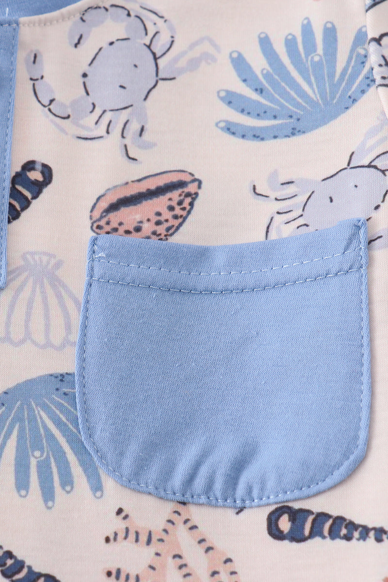 Blue ocean breeze shells print adult top