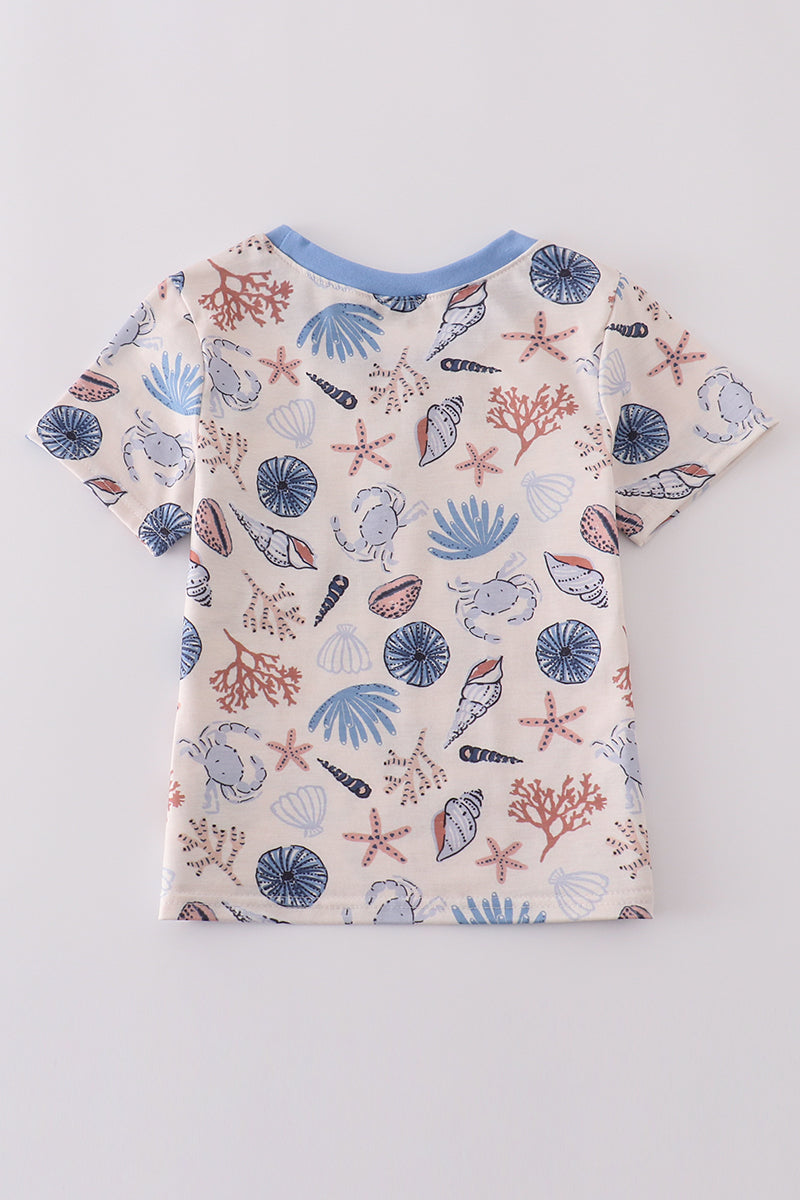 Blue ocean breeze shells print adult top