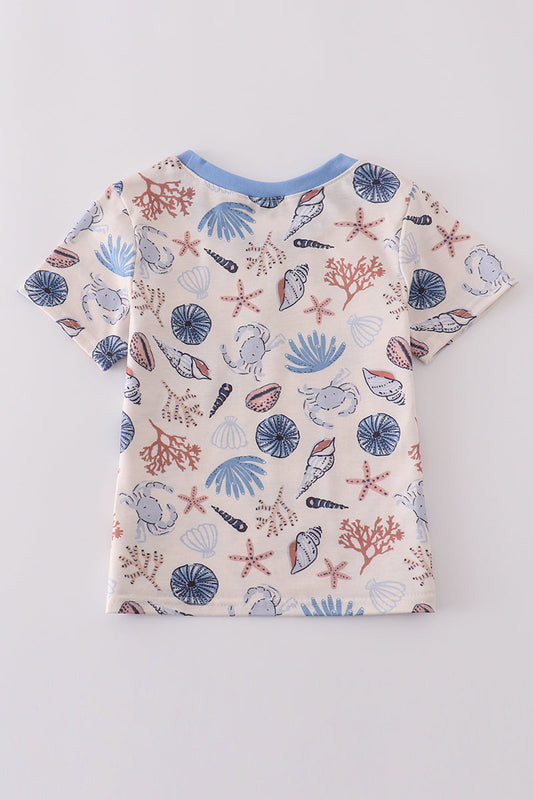 Blue ocean breeze shells print adult top