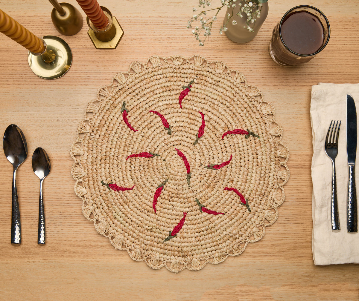 Scattered Chili Handwoven Raffia Round Placemat – Artisan Table Décor