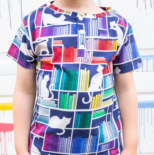 "Check Meowt" Rainbow Books & Cats Henley Short Sleeve Tee
