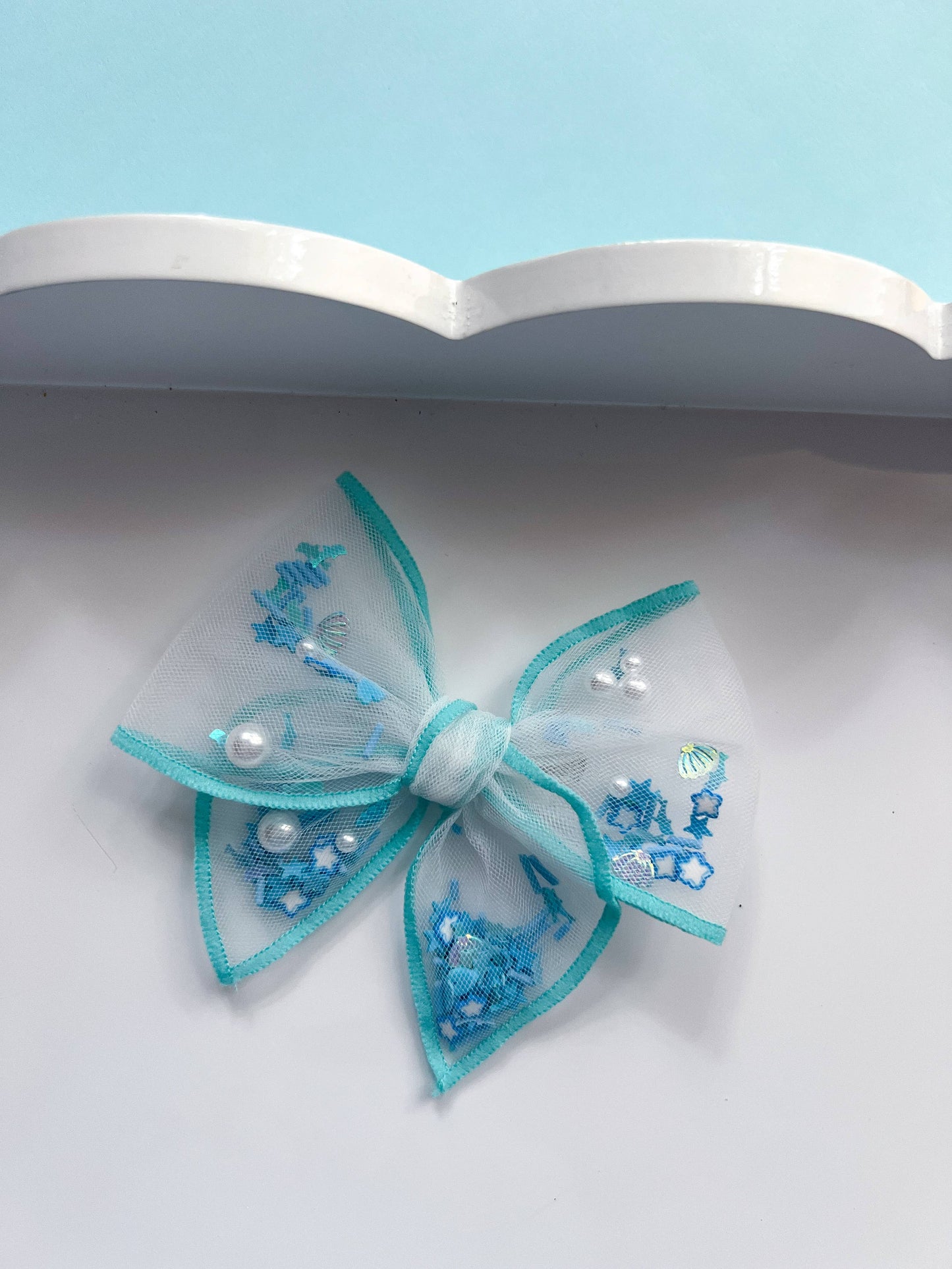 Dolphin Shaker Bow