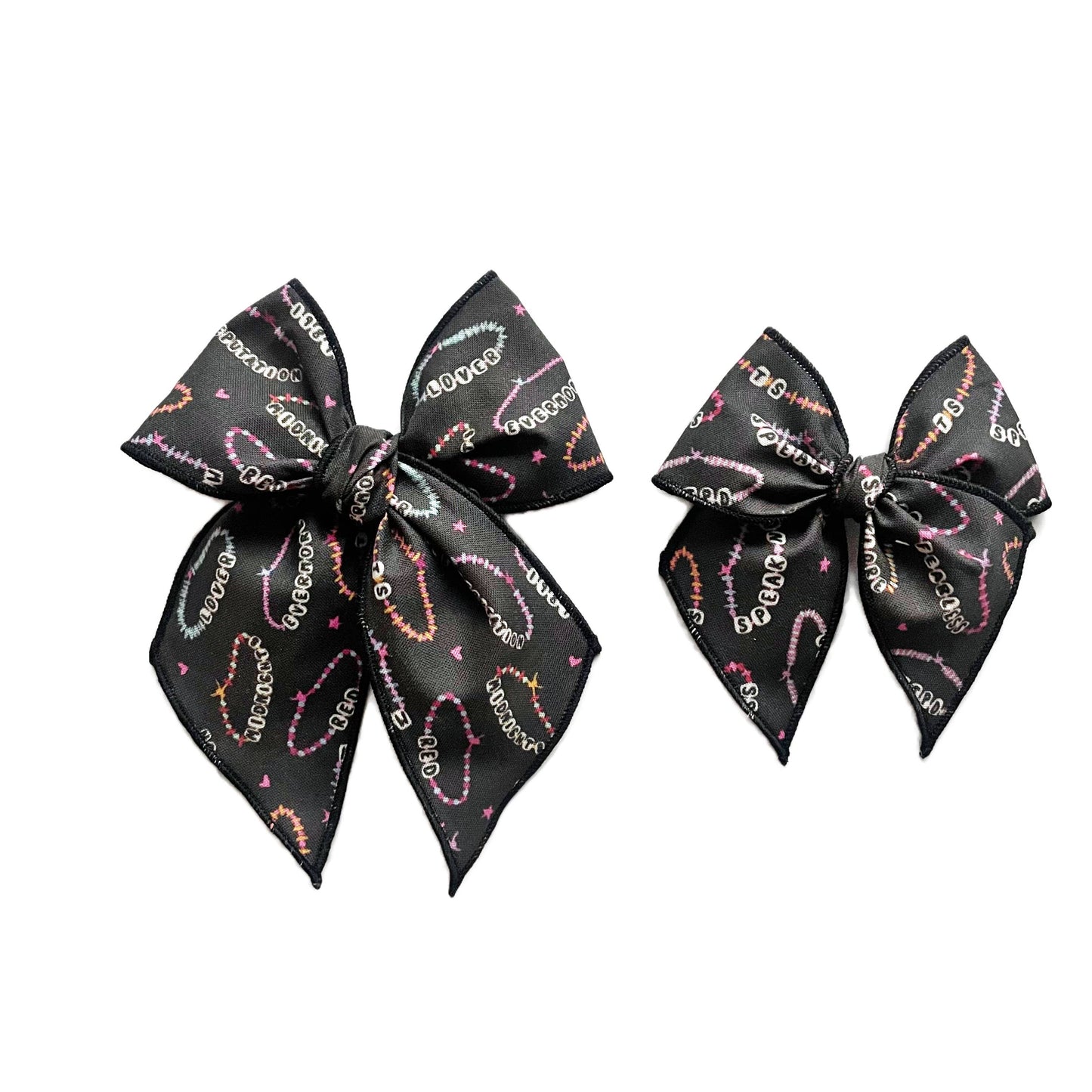 Friendship Bracelet on Black Elle Bow 