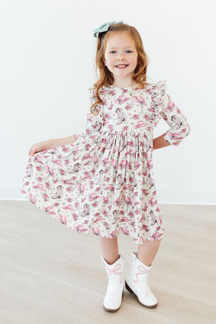 Feathered Friends Smocked Ruffle Dress
