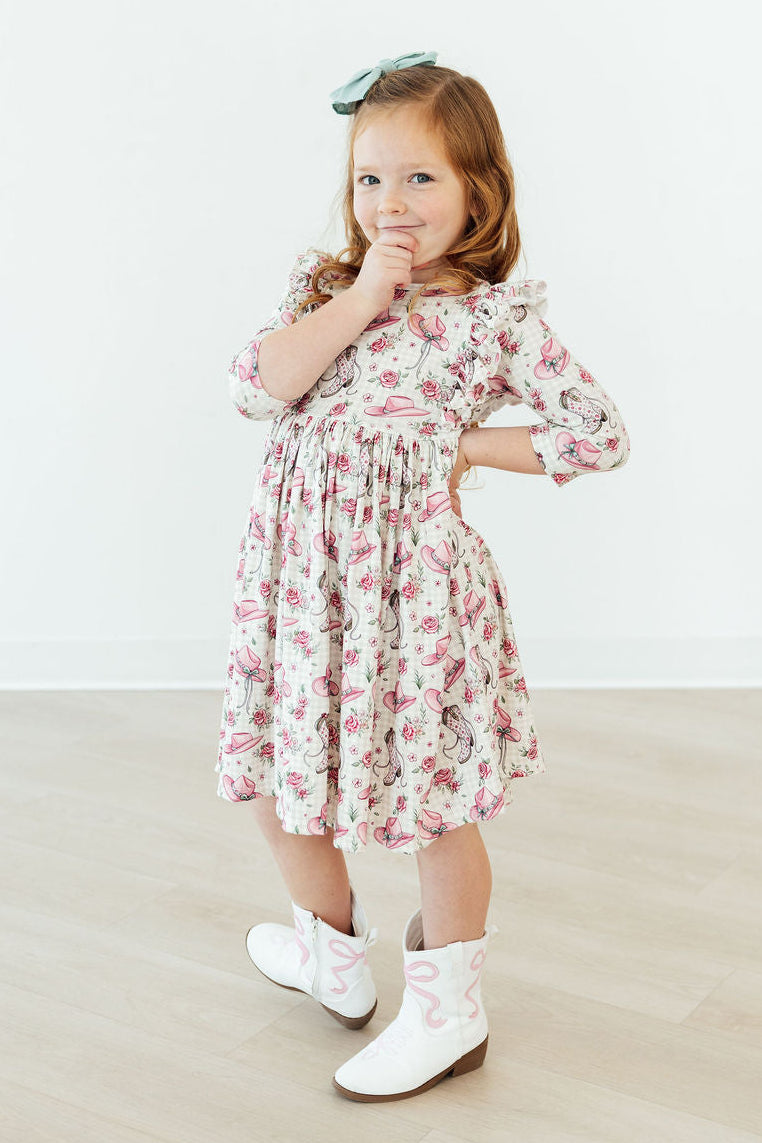 Feathered Friends Smocked Ruffle Dress