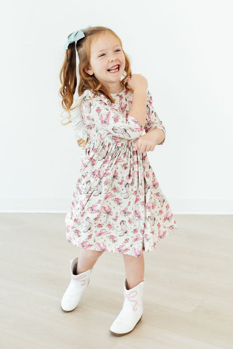Feathered Friends Smocked Ruffle Dress