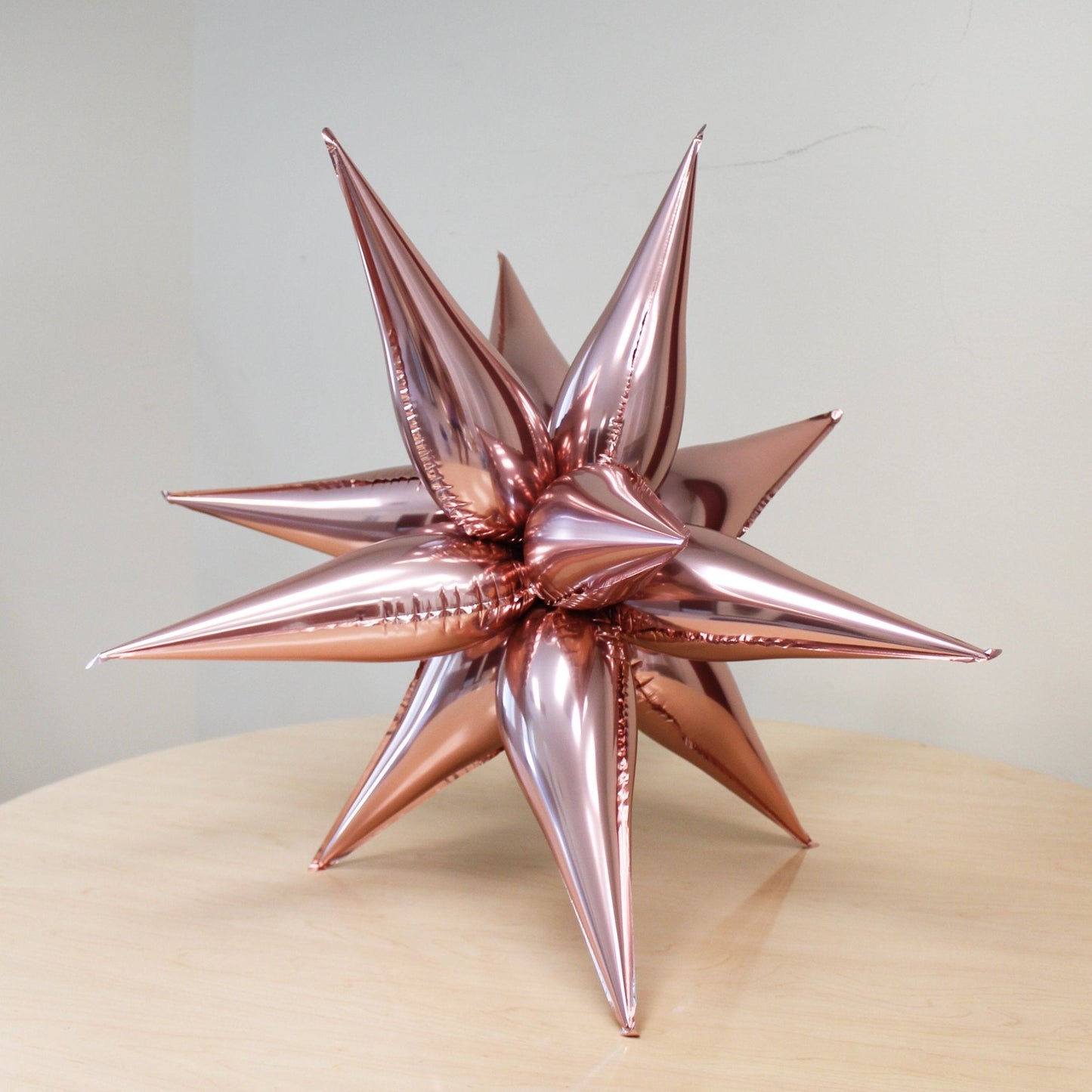 Rose Gold Starburst Balloon