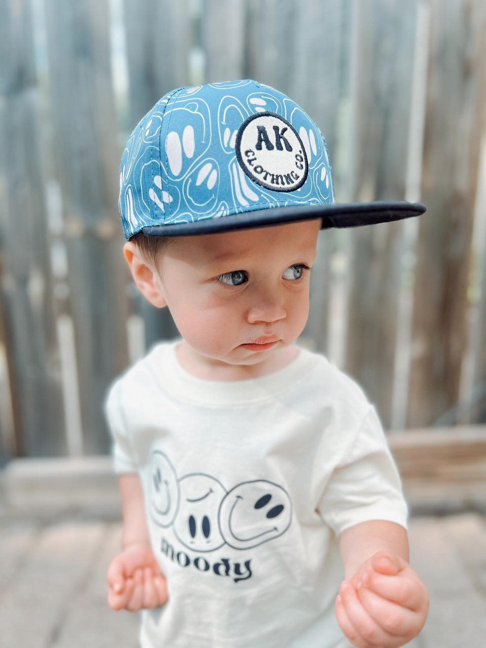 Silly face snapback hat