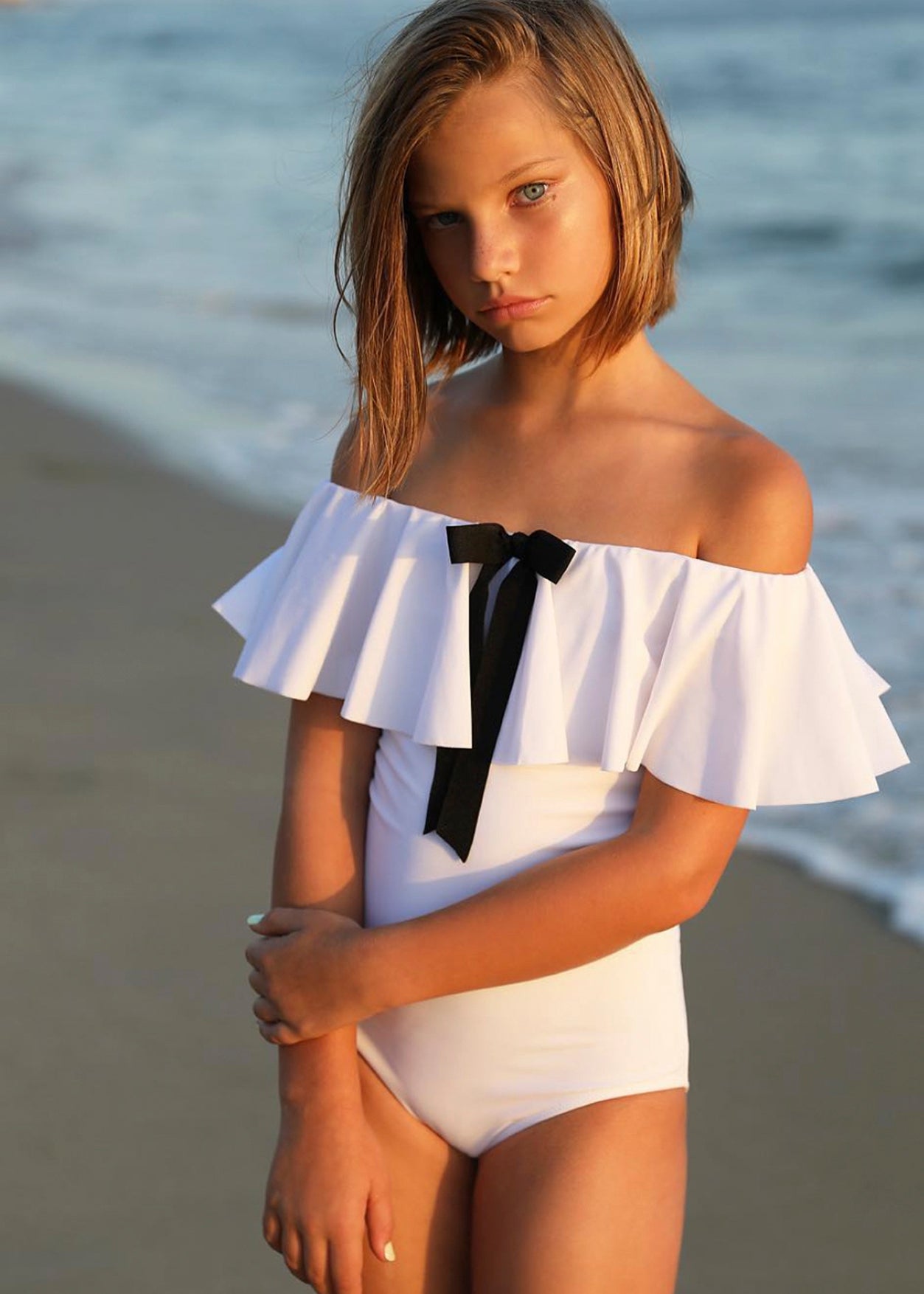 White Ruffle Swimsuit with Black Bow