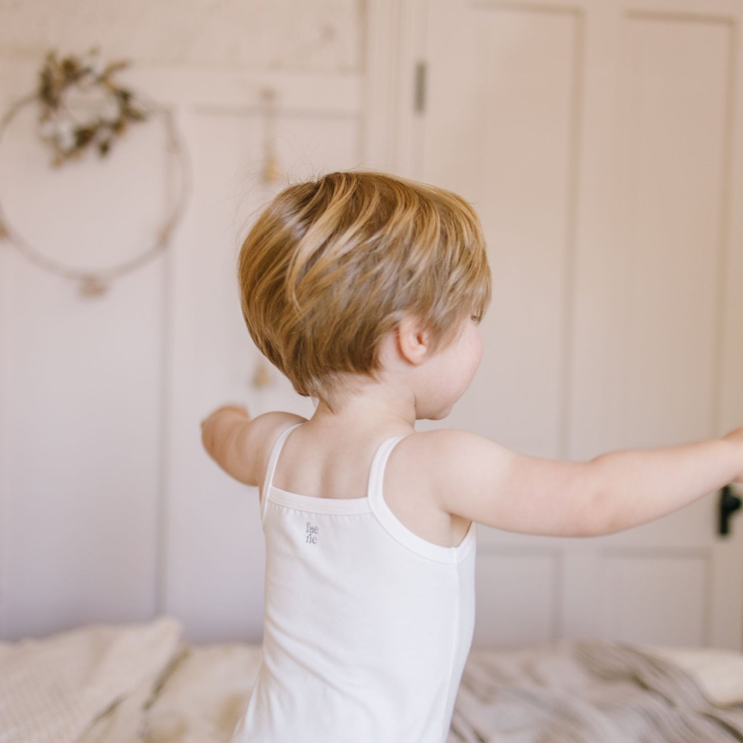 White Sleeveless Onesies